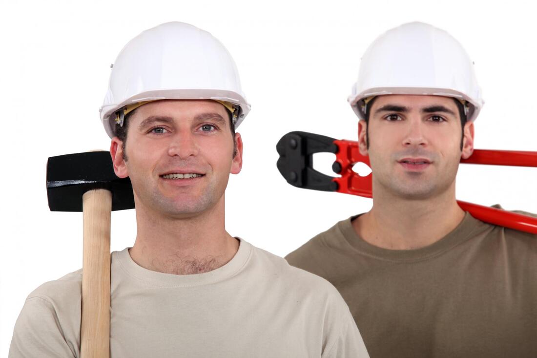 two construction workers posing